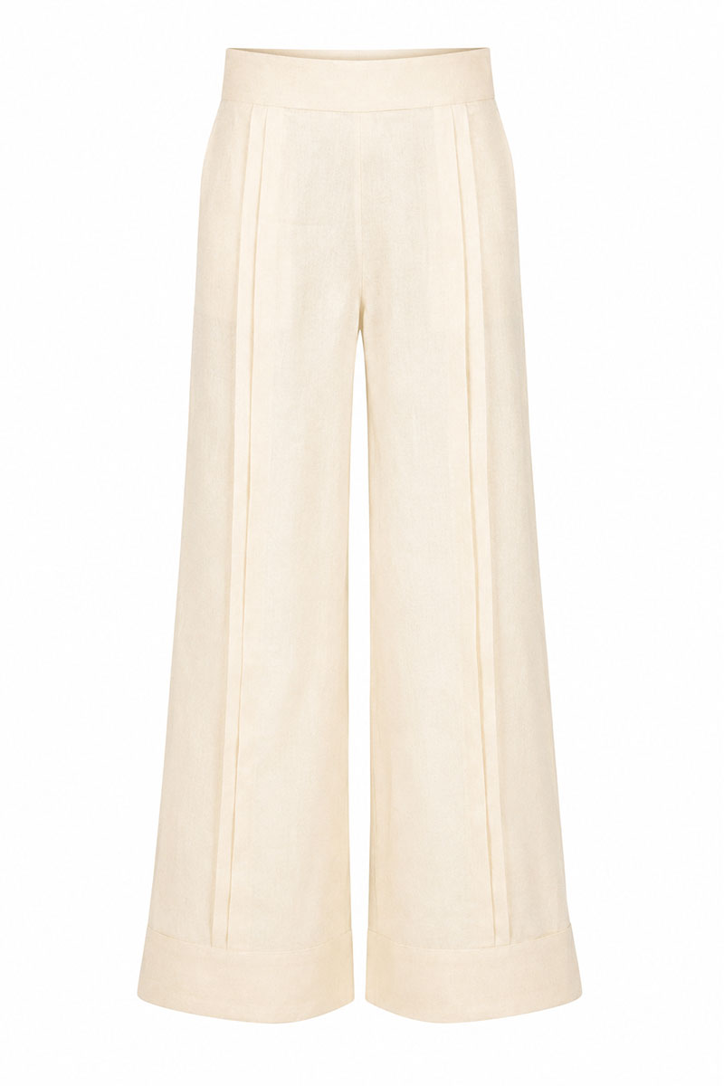 Yellow Terra pants by Ana + Maria displayed on a ghost mannequin, showcasing their relaxed fit and vibrant butter yellow color.