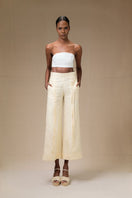 Yellow Terra Pants by Ana + Maria featuring a relaxed fit and lightweight fabric, perfect for casual wear.