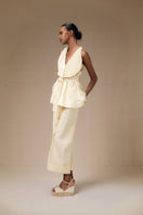 Yellow Terra pants by Ana + Maria, showcasing relaxed fit and soft fabric in butter yellow color.