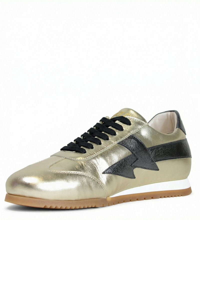Black and gold Terry de Havilland jogger bolt sneaker with flat design and stylish details, showcasing the luxury footwear style.