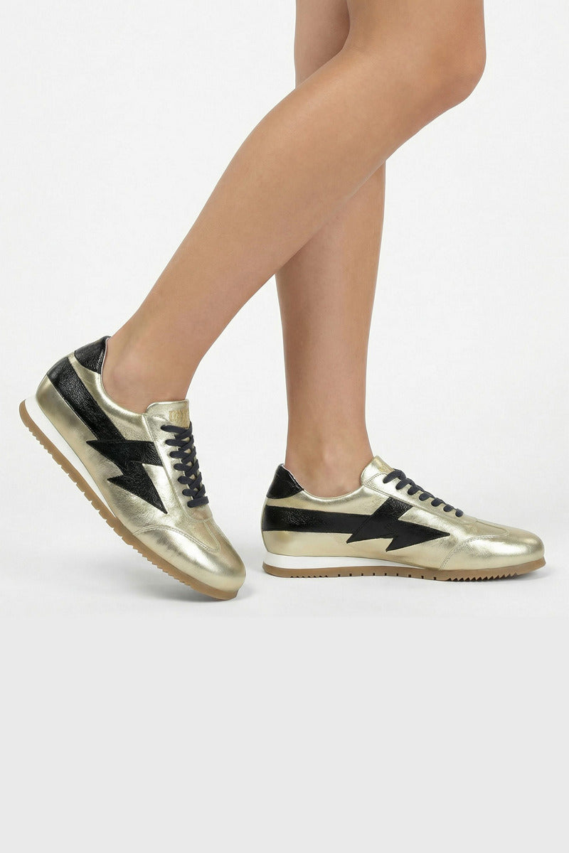 Black Terry de Havilland jogger bolt gold sneaker flats with gold accents and sleek design, showcasing a stylish, modern footwear style.