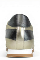 Black Terry de Havilland jogger bolt gold sneaker with flat design, featuring gold accents and a sleek, stylish look.