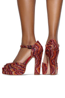 Terry de Havilland Lena Lava Red glitter block heels featuring a stylish design and vibrant red color.