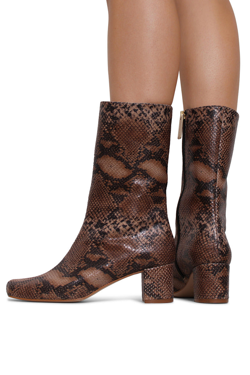 Terry de Havilland Lola Sand boots with beige suede upper and chunky heel, featuring vintage-inspired design.