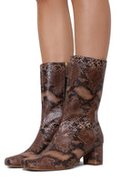 Terry de Havilland Lola Sand boots with chunky heels and leather straps, stylish footwear for casual or dressy outfits.