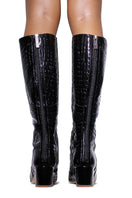 Black VAL GLOSS Boots by Terry de Havilland featuring sleek patent leather and pointed toe design.