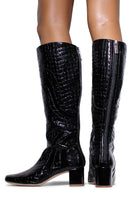 Black VAL GLOSS boots by Terry de Havilland featuring sleek leather design and pointed toes.
