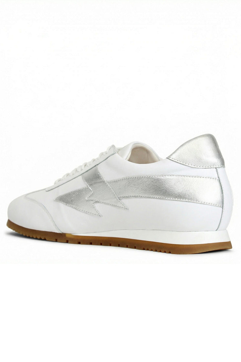 White Terry de Havilland jogger bolt flats shown from the side, featuring sleek design and minimal detailing.