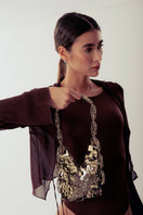 Silver Thais shoulder bag by Millanne Tale featuring a sleek metal design and adjustable strap for everyday style.
