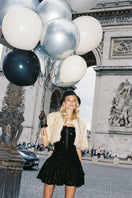 Nana Jacqueline Thalia cropped faux fur jacket displayed on a model in a fashion campaign photo.