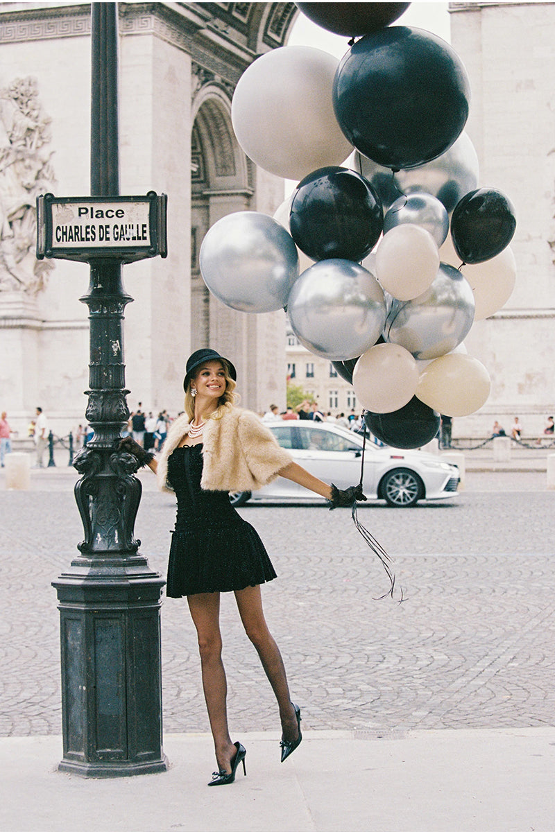 Nana Jacqueline Thalia cropped faux fur jacket in a cozy, stylish design, shown in a fashion campaign image.