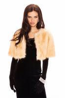 Nana Jacqueline Thalia cropped faux fur jacket displayed on a model, showcasing its plush texture and stylish design.