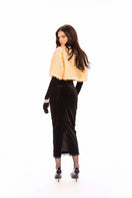 Nana Jacqueline Thalia cropped faux fur jacket displayed on a model, featuring plush texture and stylish design.