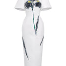 White Tiny Ink The Inner Flame Iris midi dress displayed on a hanger with flowing fabric and elegant design.