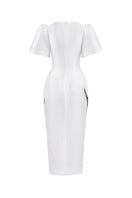 White Tiny Ink The Inner Flame Iris midi dress displayed on a hanger, showcasing its elegant, flowing design and lightweight fabric.