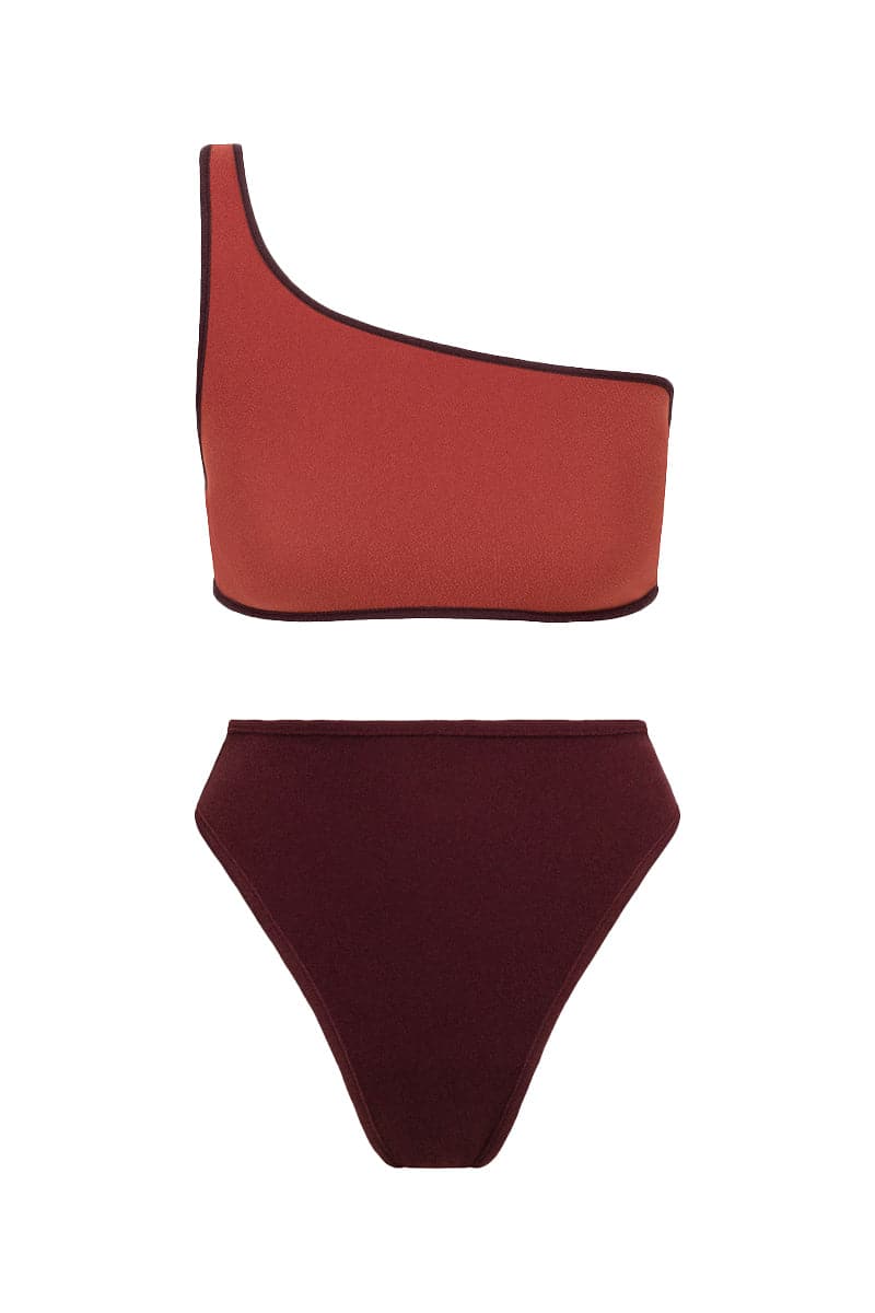 Talia Collins The Coco Terry reversible bikini with a terry top and high-rise high-cut briefs, in rosewood color, displayed on a model.
