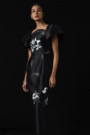 Black Tiny Ink The Twist Orchid midi dress with a fitted silhouette, featuring elegant draping and a stylish neckline.