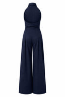 Navy blue wrapped jumpsuit by ANA + MARIA displayed on a ghost mannequin with front view, highlighting its stylish design.