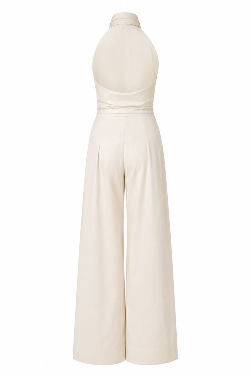 Sand-colored ANA + MARIA wrapped jumpsuit displayed on a ghost mannequin, showcasing the stylish, fitted design and fabric details.
