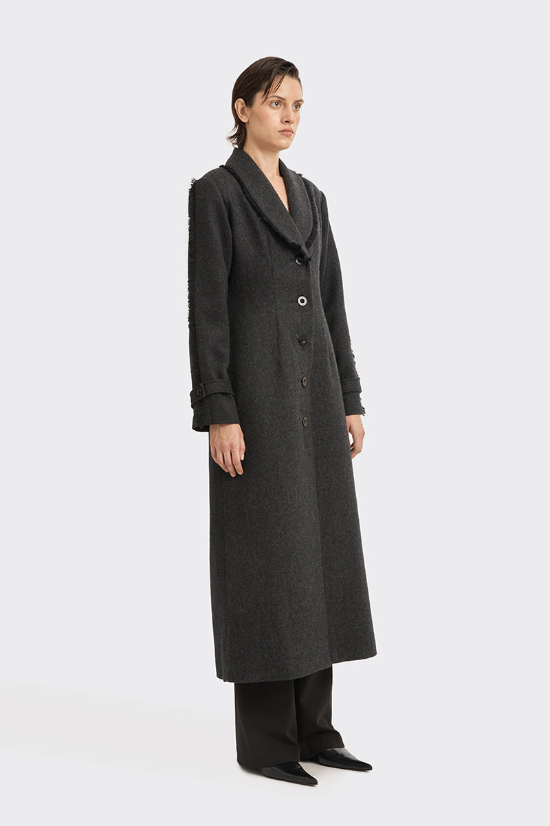 Black Thread Coat by Stolen Stores featuring a sleek design and stylish stitching, perfect for a modern, minimalist look.