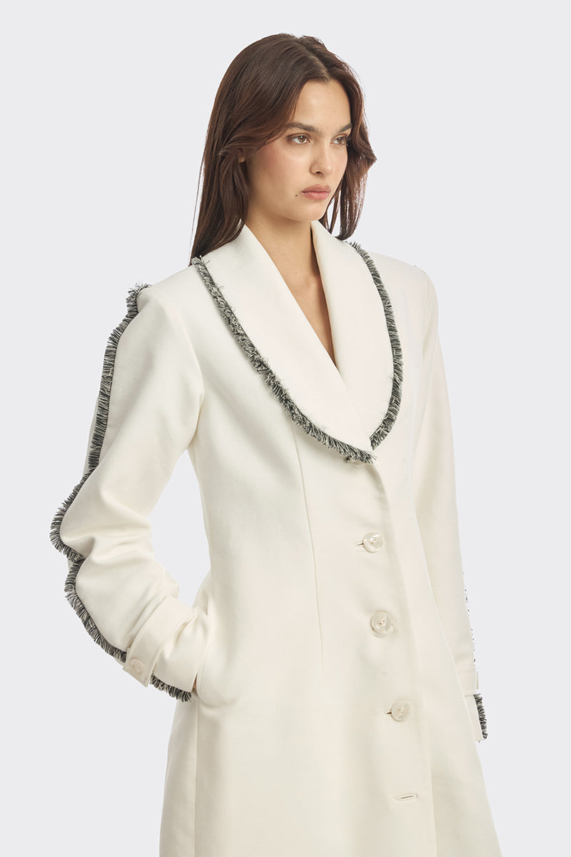 Off-white thread coat by Stolen Stores, stylish long outerwear with textured fabric and modern design, perfect for fall and winter wear.