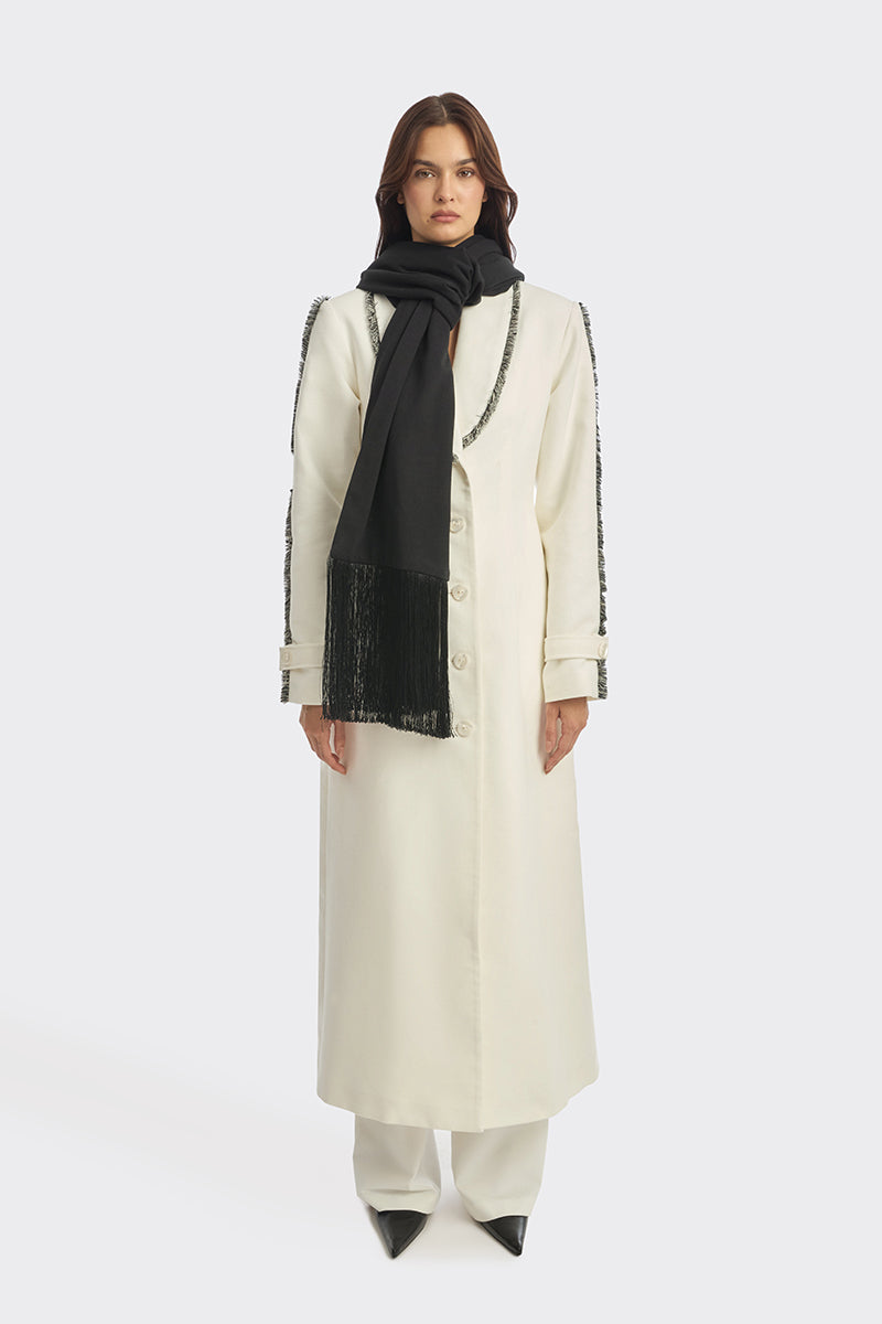 Off-white Thread Coat by Stolen Stores shown hanging with a tailored fit and minimalist design.