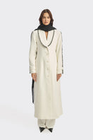 Off-white Thread Coat by Stolen Stores, stylish outerwear with a modern design and tailored fit, shown on a hanger.
