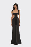 Black thread-cut-out maxi slip dress by Stolen Stores, featuring a sleek design with stylish cut-out details.