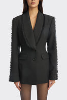 Black Thread Suit blazer from Stolen Stores, shown on model, featuring tailored fit and classic lapel details.