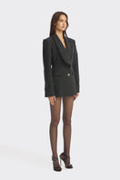 Black Thread suit blazer by Stolen Stores, tailored fit with sleek lapels, displayed on a mannequin.