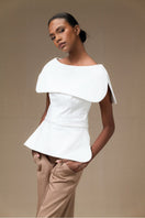 Ivory Tibet Top by ANA + MARIA, stylish sleeveless blouse with a relaxed fit, shown in black in the product image.