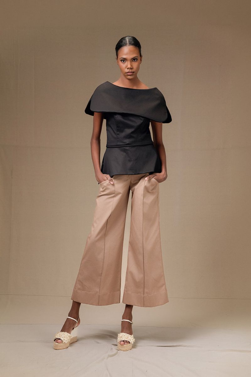 Black Tibet Top by ANA + MARIA, stylish women's sleeveless sleeveless top with a relaxed fit and simple design.