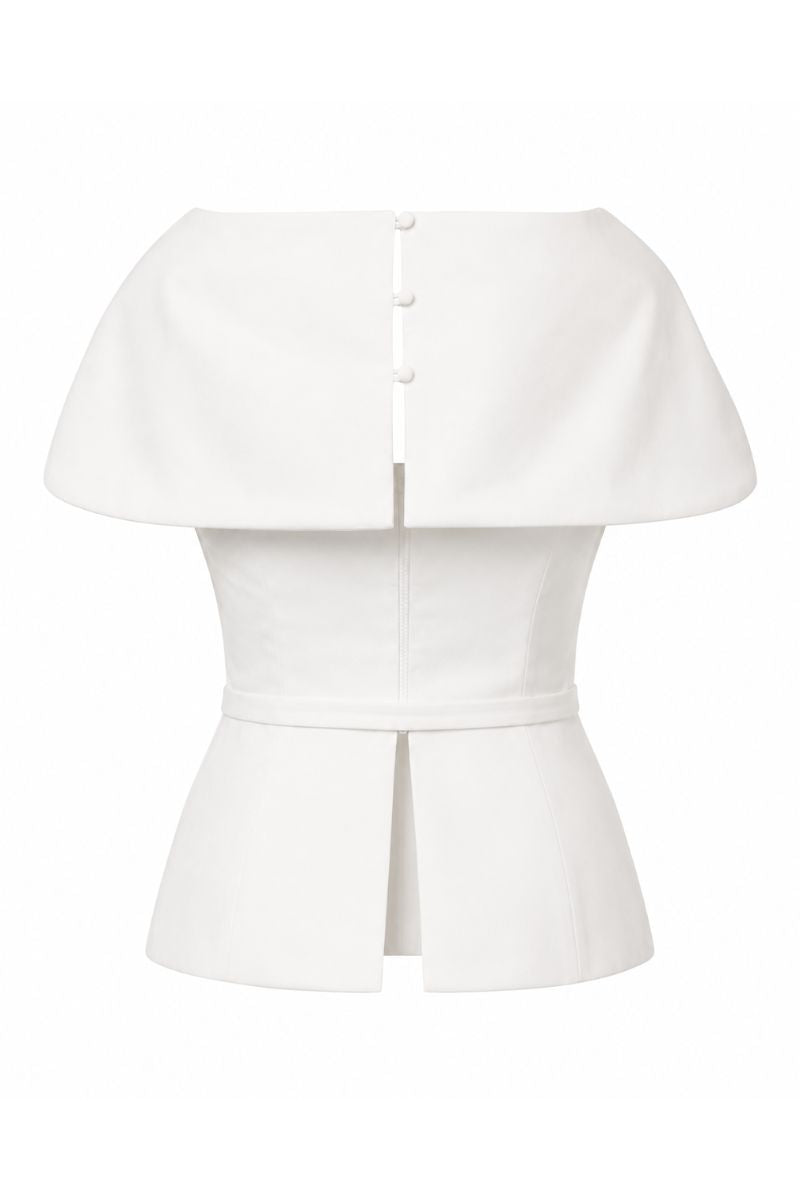Ivory Tibet Top by ANA + MARIA displayed on a mannequin, showcasing its soft fabric and relaxed fit.