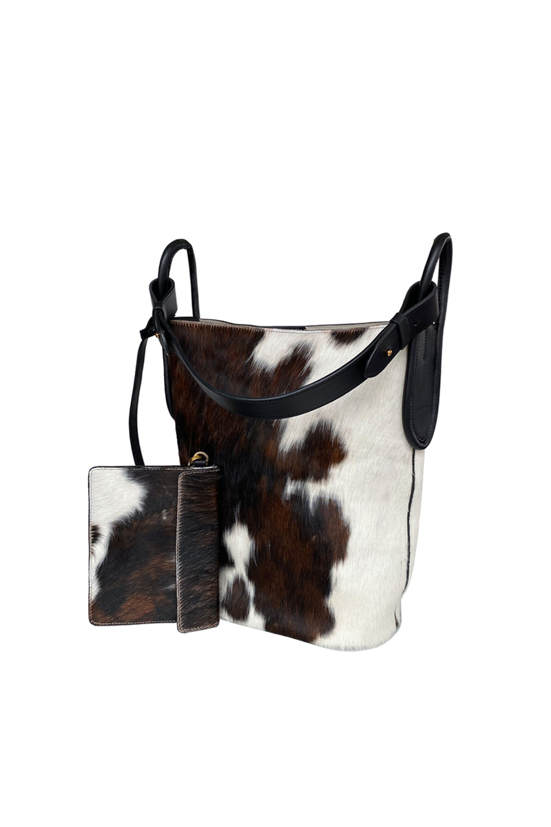 ISIDORA MALVA Tierralta tote shoulder bag made of cowhide with natural hair texture, featuring a spacious design and sturdy straps.