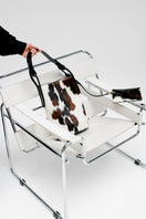 ISIDORA MALVA Tierralta tote shoulder bag in cowhide with natural hair texture, stylish and spacious accessory.