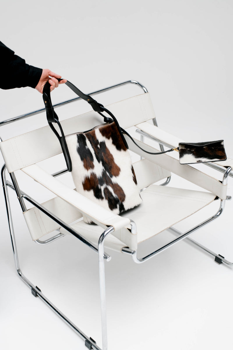 ISIDORA MALVA Tierralta tote shoulder bag in cowhide with natural hair texture, stylish and spacious accessory.