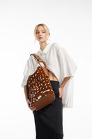 ISIDORA MALVA Tierralta Tote Bambi shoulder bag with leather handles and floral fabric design, stylish and spacious for everyday use.