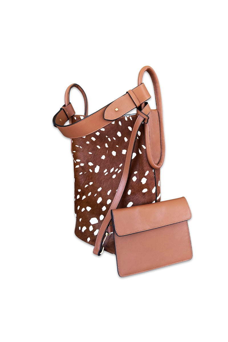 ISIDORA MALVA Tierralta Tote Bambi shoulder bag with black leather handles and beige fabric body featuring floral print.