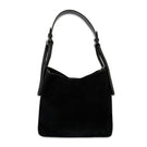 Black suede TIERRANUEVA tote bag with top handle by ISIDORA MALVA, featuring a sleek, minimalist design and structured silhouette.