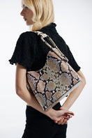 ISIDORA MALVA Tierranueva tote bag with snake print, top handle design, stylish and versatile accessory.