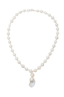 Elegant pearl baroque necklace by Oz Objects featuring intricate, timeless design showcasing luxurious, natural pearl details.