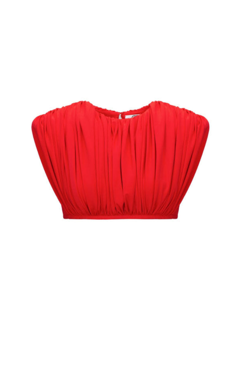 Red wide-shoulder top by Santa Brands, featuring a stylish design with exaggerated shoulder details and a vibrant color.