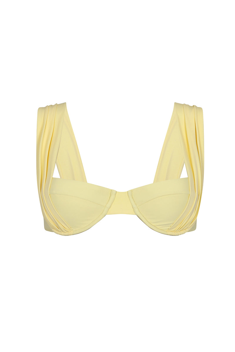 Nelblu MAREA blonde bikini top featuring a stylish design and adjustable straps, perfect for beach or poolside wear.