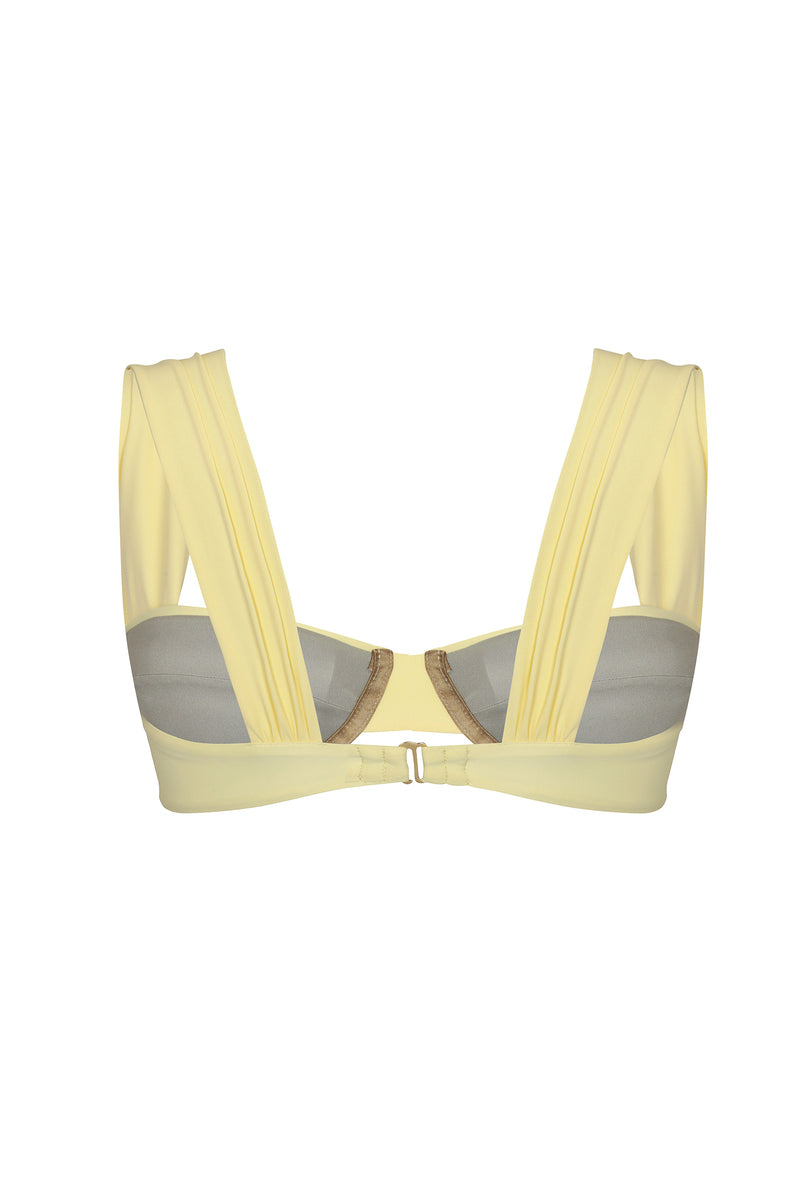 Nelblu Marea blonde bikini top with adjustable straps and vibrant pattern, perfect for beach or poolside wear.