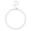 Silver Toulouse necklace by Velvet Desert featuring a delicate chain and elegant pendant lying flat on a neutral background.