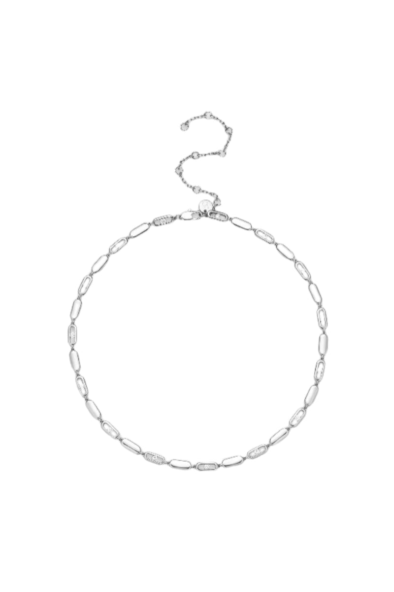 Silver Toulouse necklace by Velvet Desert featuring a delicate chain and elegant pendant lying flat on a neutral background.