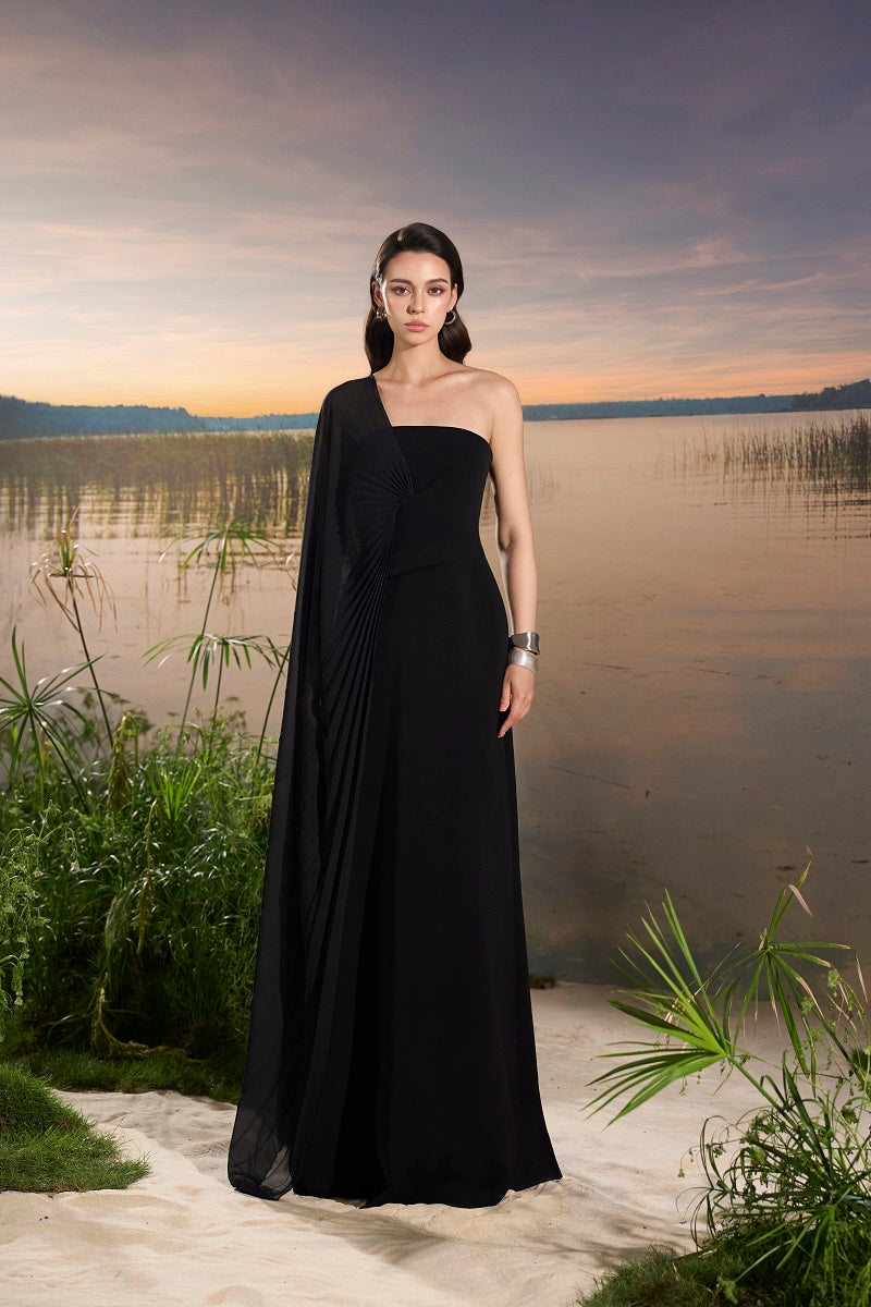 Velvet satin asymmetric cape sleeve maxi dress by Tracy Studio, elegant black dress with flowing fabric and stylish cape sleeves.