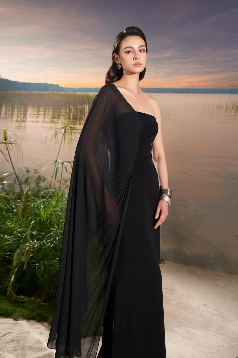 Velvet satin asymmetric cape sleeve maxi dress by Tracy Studio, elegant black dress with flowing silhouette and stylish cape detail.
