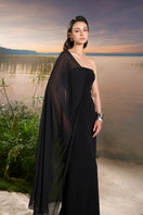 Velvet satin asymmetric cape sleeve gown by Tracy Studio, elegant evening dress with flowing fabric and stylish design.