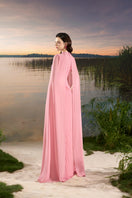 Elegant chiffon crystal bead gown by Tracy Studio featuring flowing fabric and intricate bead embellishments.